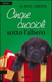 Cinque cuccioli sotto l'albero