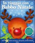 In viaggio con Babbo Natale. Con adesivi. Ediz. illustrata