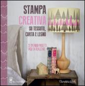 Stampa creativa su tessuto, carta e legno