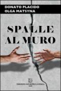 Spalle al muro