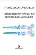 Nozzle flow effects on the near field of a round jet