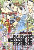 La sposa davanti alla stazione