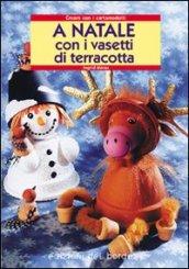 A Natale con i vasetti di terracotta