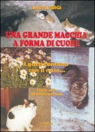 Una grande macchia a forma di cuore. I gatti contano con il naso...