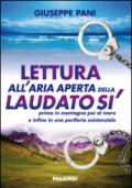 Lettura all'aria aperta della Laudato sì prima in montagna poi al mare e infine in una periferia esistenziale