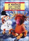 A Natale con i vasetti di terracotta